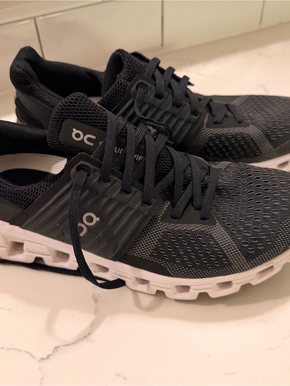 On Running Women’s Black and White Cloudrunning Athletic Sneakers